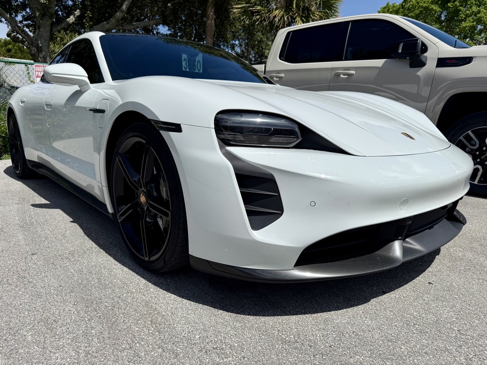 White Porsche Taycan collision repair